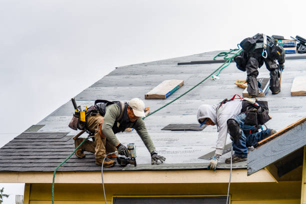 Professional Gutter Installation technician working in Oakland City, IN